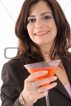shot of a woman in suit having cocktail upclose
