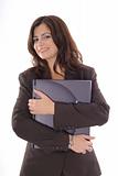shot of a woman in suit holding a laptop
