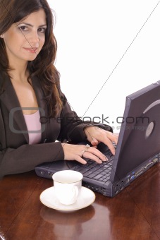 shot of a beautiful woman working on computer smile