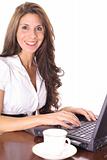 shot of a brunette working on the computer