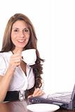 shot of a woman having a tea break at the computer