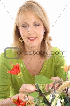 shot of a florist making flower arrangement upclose