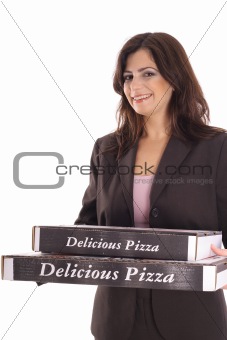 shot of a woman in business suit carrying pizzas