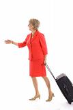 shot of a woman walking with luggage