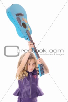 shot of a rockstar child smashing her guitar