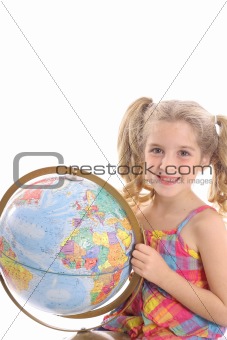 shot of a little girl holding globe vertical