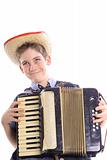 shot of a happy young boy playing an accordian vertical