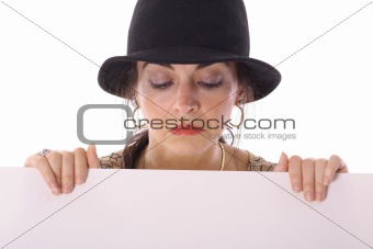 shot of a woman in hat looking over copyspace