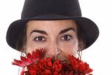 shot of a woman in hat with flowers