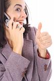 shot of a business brunette on the phone thumbs up