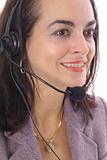 shot of a brunette with headset upclose
