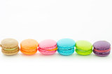 Colorful macaroons on white.