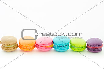 Colorful macaroons on white.