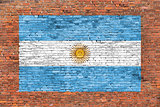 Flag of Argentina painted on brick wall