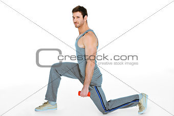 Sporty concept for young athlete with dumbbells