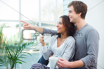 Young mixed race couple at home