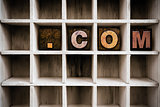 Dot Com Concept Wooden Letterpress Type in Draw