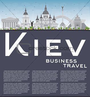Kiev skyline with grey landmarks and blue sky.