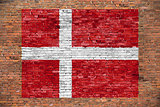Flag of Denmark painted on brick wall