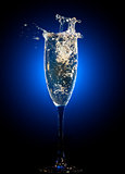 Glass of champagne with splashes