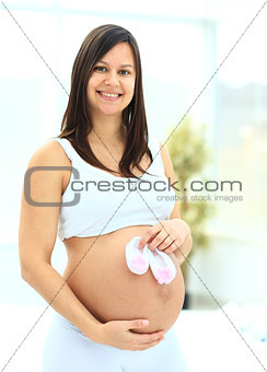 Pregnant woman contemplates t