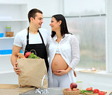pregnant woman and her husband prepare