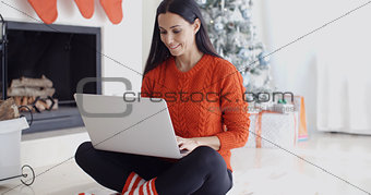 Young woman relaxing at home over Christmas