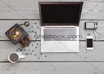 Workspace on a wooden table from above