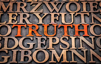 truth word abstract in wood type 