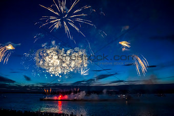 colorful fireworks on the sky background over-water
