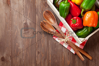 Fresh colorful bell peppers in box