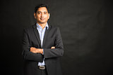 indian male businessman black background
