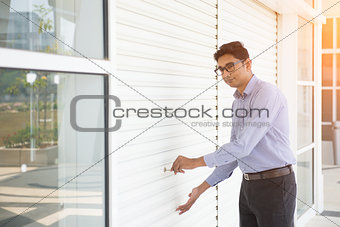 indian business male checking properties