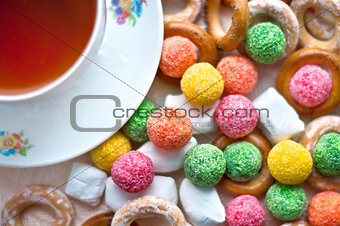 Cup of tea with candy
