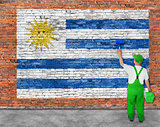 House painter paints flag of Uruguay 