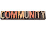 community banner in wood type