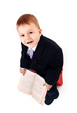 Boy with books for an education portrait