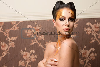 woman with golden xmas make-up 