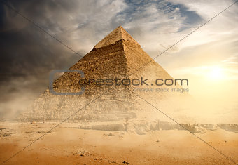 Pyramid in sand dust