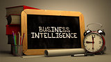 Business Intelligence Handwritten on Chalkboard.