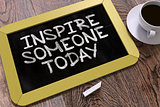 Inspire Someone Today on Chalkboard.