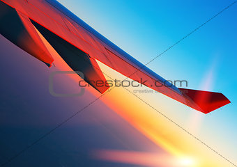 Air travel at sunrise