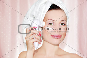 beautiful woman cleaning face