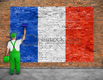 House painter paints flag of France 