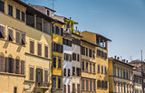 Old houses with blinds in the historic center of Florence