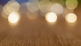 Wooden table with bokeh lights