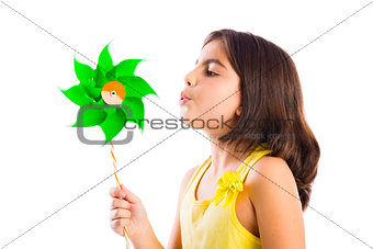 Girl blowing a windmill