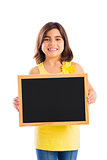 Girl holding a chalkboard