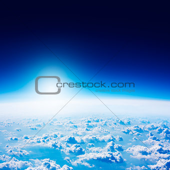 Earth View from Space. Dark Blue Sky and Clouds.