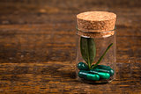 Alternative homeopathic medicine in glass container